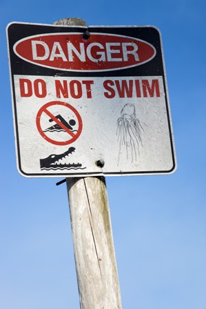 Swimming around Darwin can be dangerous. Obey the signs.